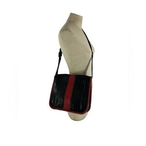 Genuine vintage black leather shoulder bag with red lizard trim